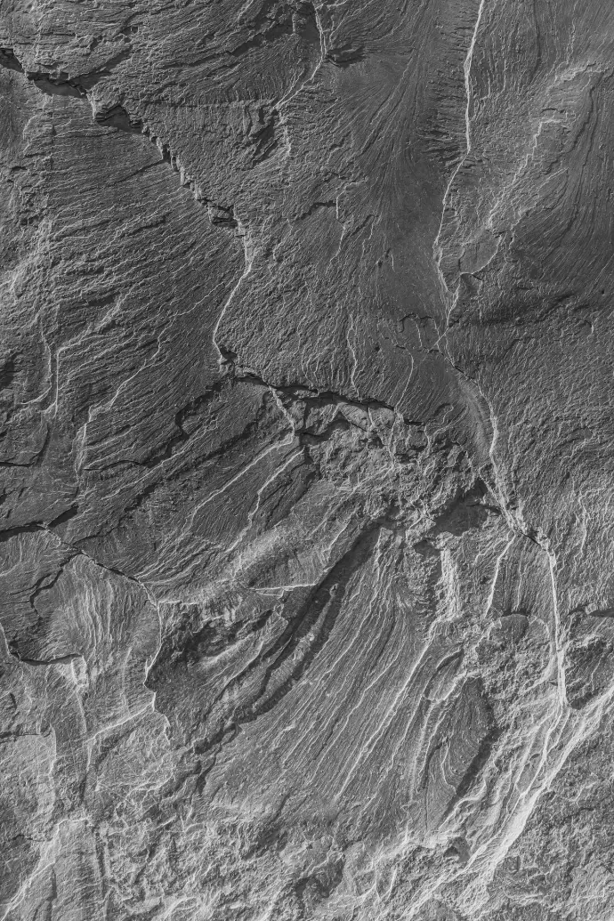 grayscale photo of rock formation